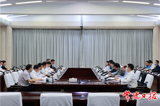 曹志強周振宇與省國資委考察團一行座談